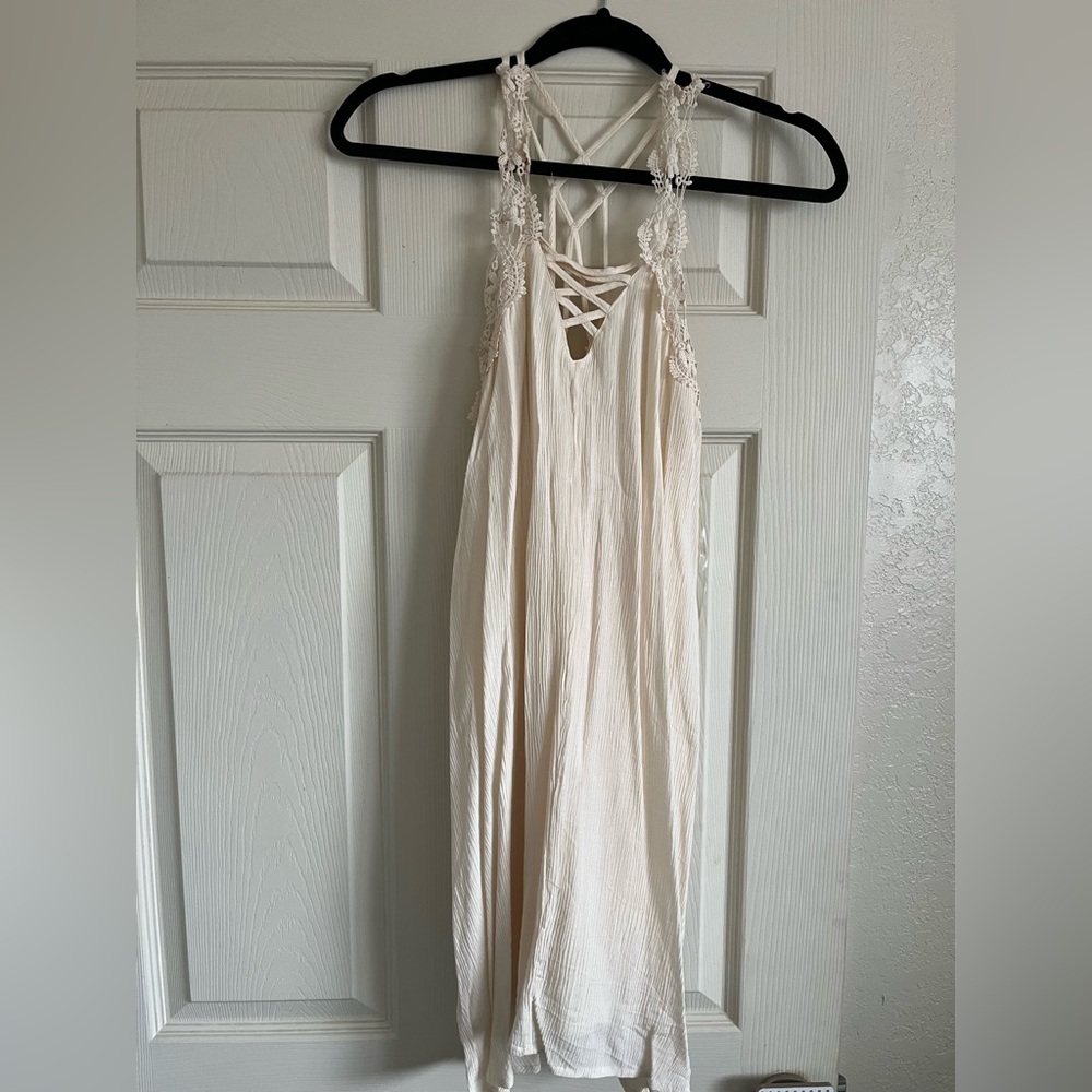 Women’s cream dress.